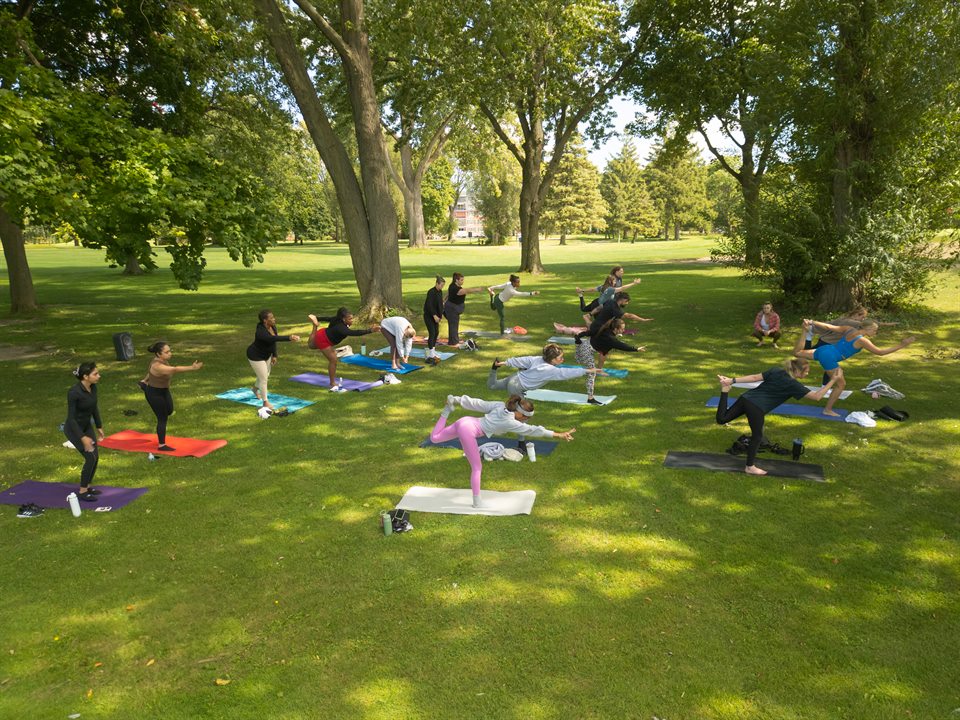 Yoga 6 outdoor class photographed from above