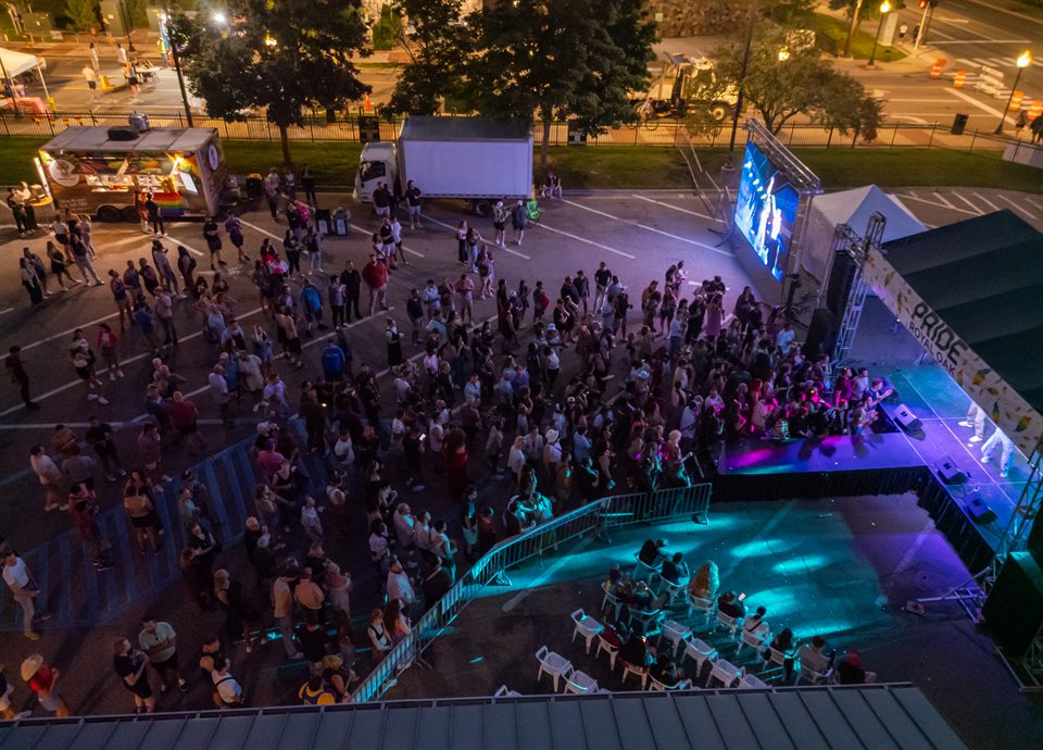 Colorful Royal Oak Pride night crowd seen from above