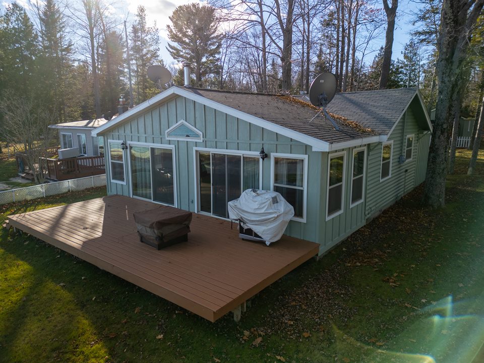 Lakefront cottage and surrounding landscape
